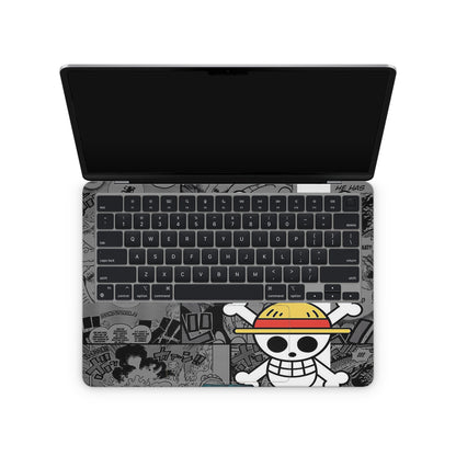 macbook skin with one piece luffy gear 5 design on keyboard area