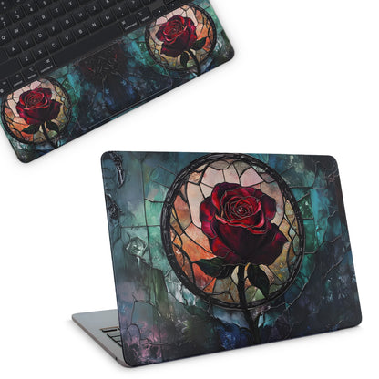 Laptop with a stained glass rose design on a white background