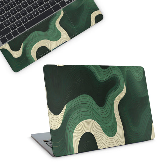 Laptop with a green and beige abstract pattern on a white background