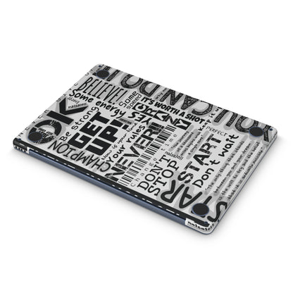 macbook skin with motivational text on bottom