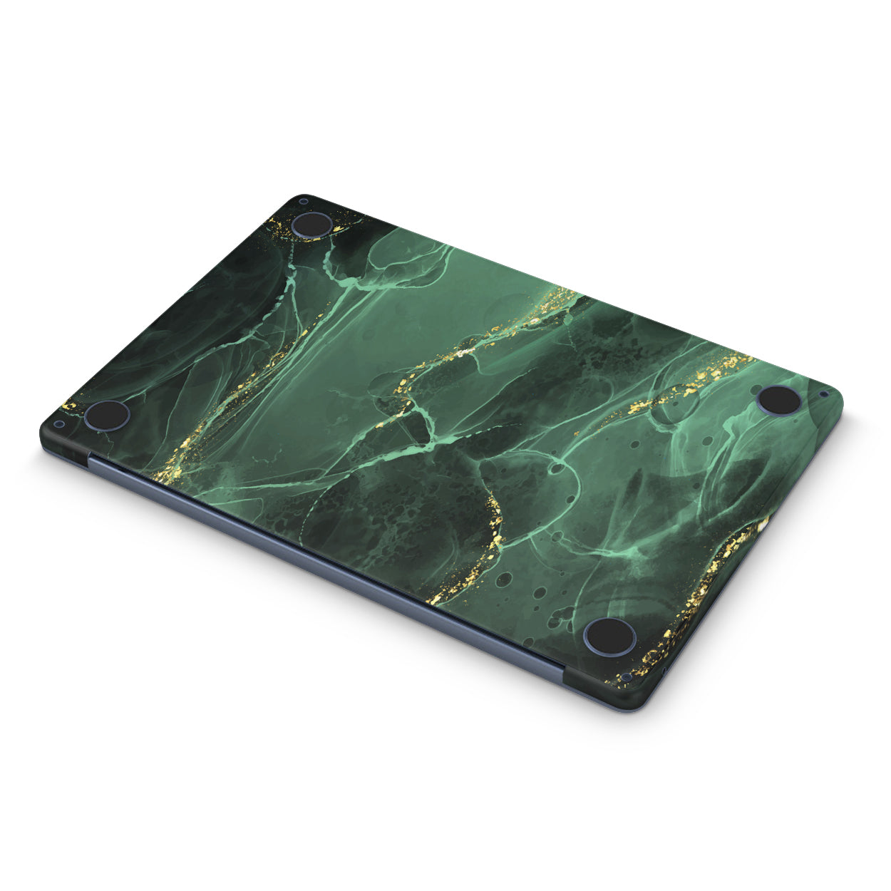 macbook skin with green ink design on bottom