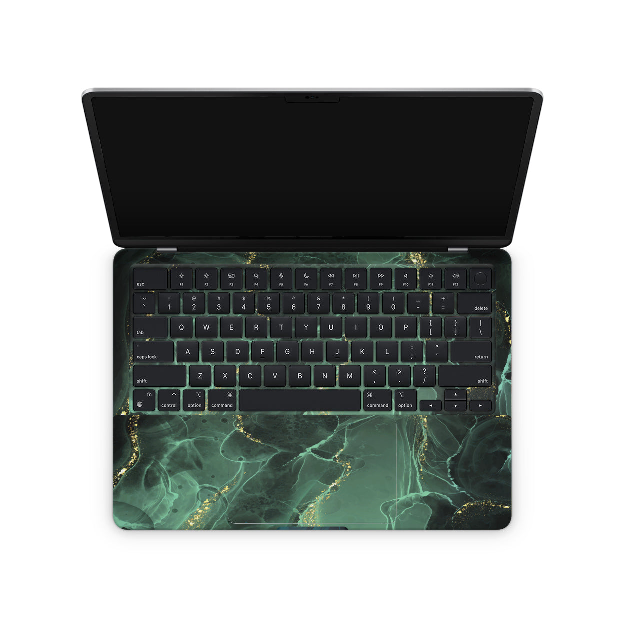 macbook skin with green ink design on keyboard area
