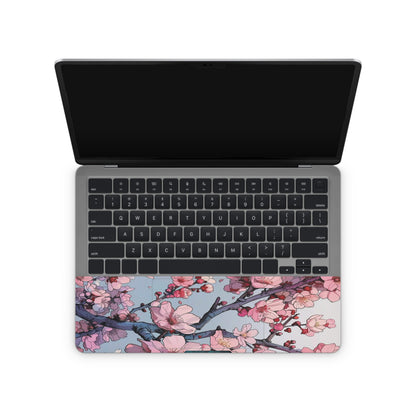 laptop skin with cherry blossom design on touchpad area