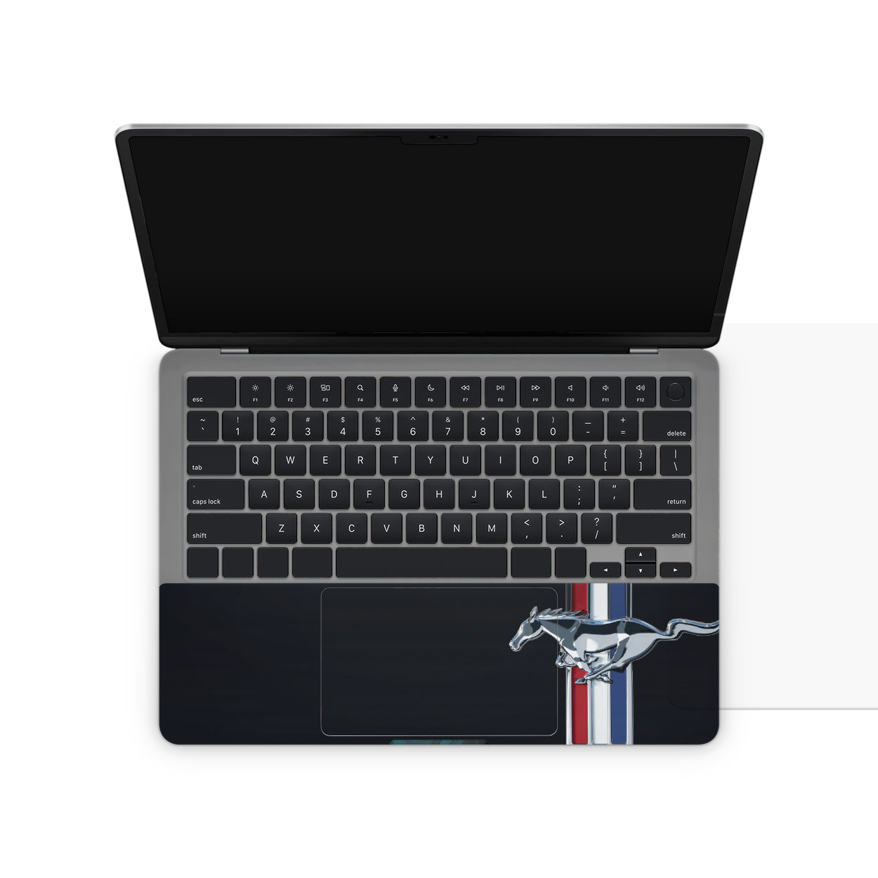 Laptop skin with a Ford Mustang logo on the touchpad area